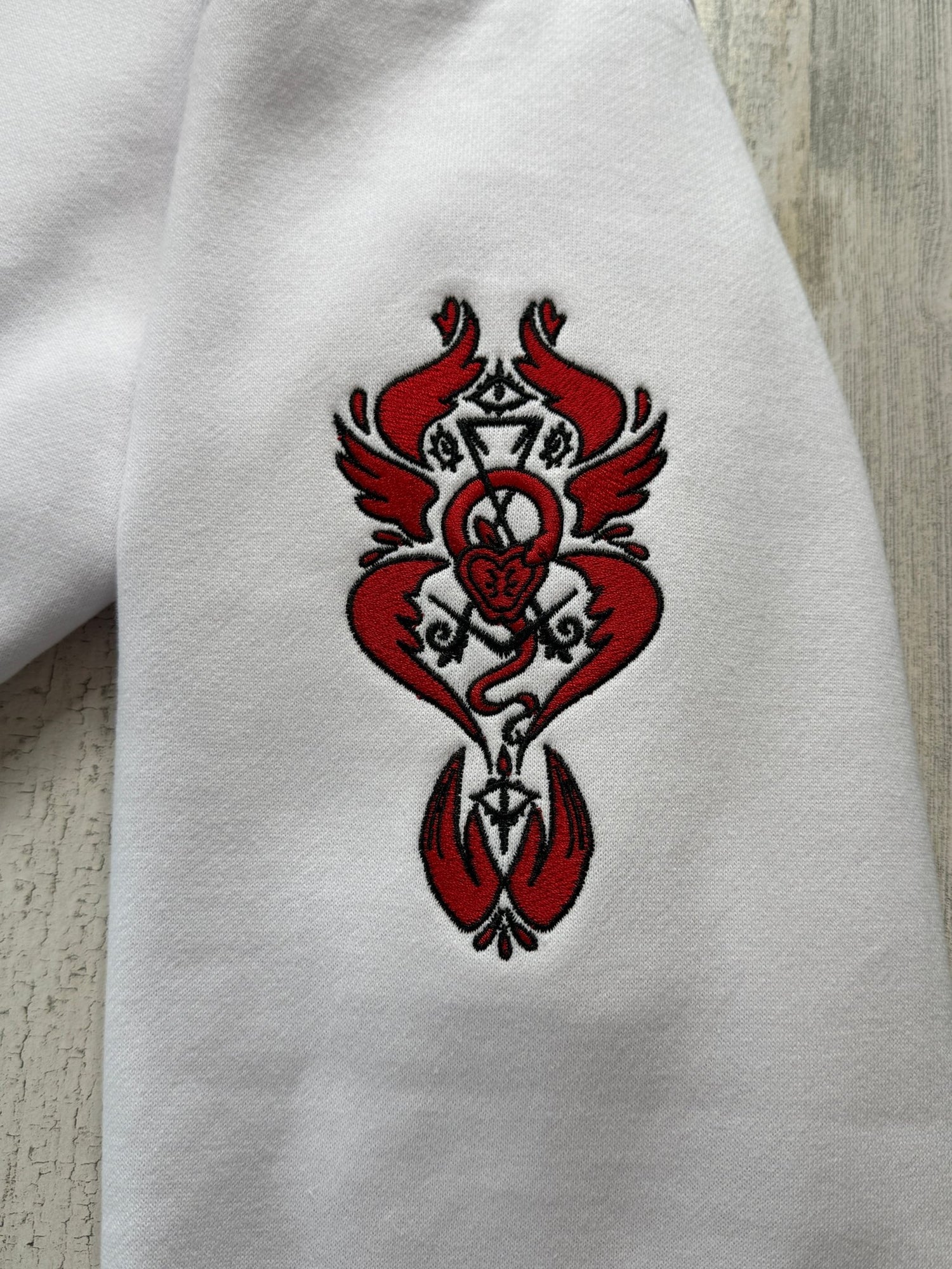 Lucifer Winged Embroidered Sweatshirt - DefiantThreads